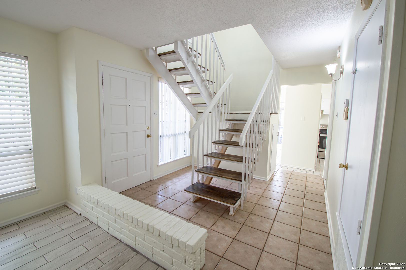 Come check out this condo in a great location! Perfect for entry-level home ownership.  The condo is within walking distance to HEB and right off I-10 highway and Wurzbach. CLOSE TO MEDICAL CENTER in Gated Community, 24/7 camera surveillance, 2 Assigned Parking, and 2 storage for each Unit. HOA includes Water, Trash, and Landscaping   The condo is 1148 sqft. Two stories with a contemportay staircase with 2 bedrooms and 1.5 half baths situated on the Northside of San Antonio and conveniently located to Northstar Mall, The Shops at La Cantera, Six Flags Fiesta Texas, fine dining, and downtown San Antonio.