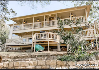Currently used as a short-term rental located on beautiful Lake Seguin which is designated as a Texas Parks and Wildlife Canoe Paddling Trail on the Guadalupe River.  Enjoy the relaxation of sitting on your back deck and enjoying your morning cup of coffee or taking to the water....it's perfect for swimming, jet skis, fishing boats, kayaks and canoes, paddle boarding or just lazily floating.  Even your own boat ramp is on site.  Very secluded feeling, yet minutes from town, shopping, and restaurants.