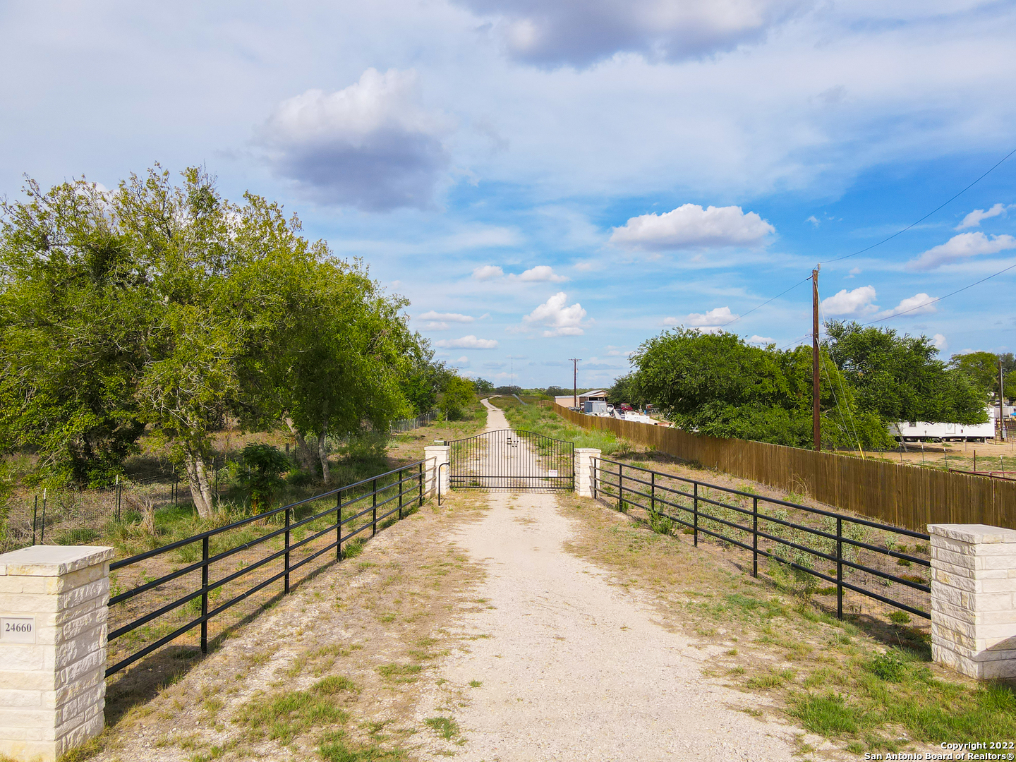 45 acres of grazing, hunting or homestead!   Bring your farm animals or build on your lot!   Cattle guard already in place Ag exemption pending, great hunting just 25 min from downtown San Antonio!  3000 water tank, septic, electric existing on property. City water available at the road.