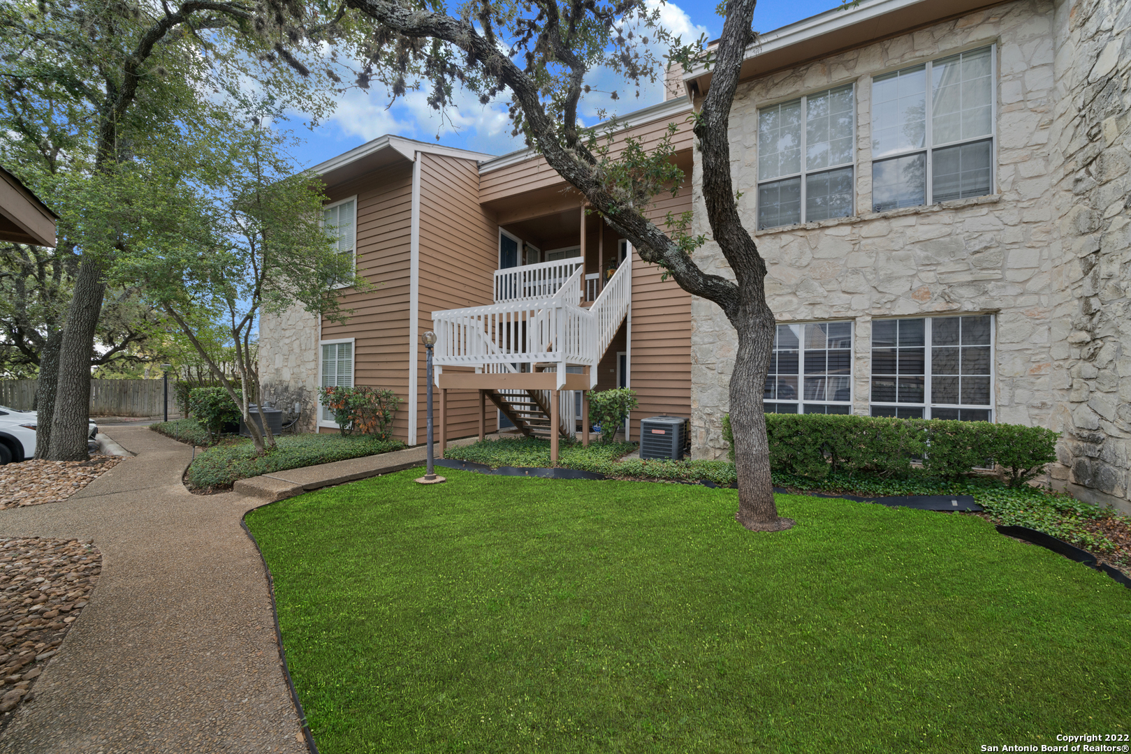 *** MULTIPLE OFFERS HAVE BEEN RECEIVED; PLEASE SUBMIT YOUR FINAL AND BEST OFFER BY TOMORROW WEDNESDAY 31st AT 9 AM*** MOVE IN READY! Well maintained and updated 2 Bedroom 2 Bath beautiful condominium! Convenient to all things UTSA, Loop 1604 & IH-10, La Cantera, The Rim, and the list goes on! Laminated wood floors through the house, Ceramic tile in kitchen and bathrooms! No carpet,  Wood burning fireplace,  abundant natural lighting front and back, Pool and clubhouse close by. One assigned covered parking space outside the front door with plenty of open parking. New paint inside 8/22,  HVAC replaced 2020.