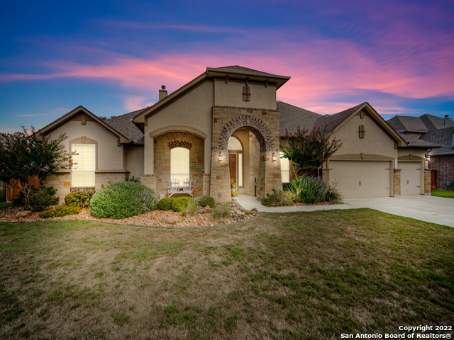 Classy yet comfortable, this 1.5 story, 5 bedroom/4 full bath stone and stucco home on a huge estate lot in the sought-after Boerne ISD neighborhood of Balcones Creek just off I-10 offers an easy, easy commute to Valero, UTSA, the Medical Center and the San Antonio Airport! Oh SO MANY upgrades: The main floor living room, fireplace and breakfast bar boast floor to ceiling dry-stack Hill Country rock walls. A dream kitchen with top of the line granite, a 6-burner gas stove with a pot filler, huge center island, tons of custom cabinetry accented with glass fronts, stone backsplash and a butler's pantry. Sunny windows and a flowing floorplan lead to a grand primary suite, formal dining/piano room and a separate study with custom shelving and high ceilings. The secondary baths have high Silestone vanity tops and tile tub surrounds. The whole house is serviced by a tankless water heater. Upstairs is a secondary living room that makes a great media or game room next to a 5th bedroom and 4th full bathroom. This 1/2 acre, park-like estate lot has a huge covered back patio with an outdoor fireplace with a gas lighter and 2 ceiling fans opening up to the sprawling fenced backyard complete with a pond, storage shed, ancient oaks and room to roam and garden. The 3 car garage with epoxy floors has exceptional custom cabinetry and wall and ceiling rack storage second to none. This gated neighborhood is loaded with exceptional amenities - pool/clubhouse/jogging and biking trails and so much more! You cannot build this home for this price today - come see for yourself!
