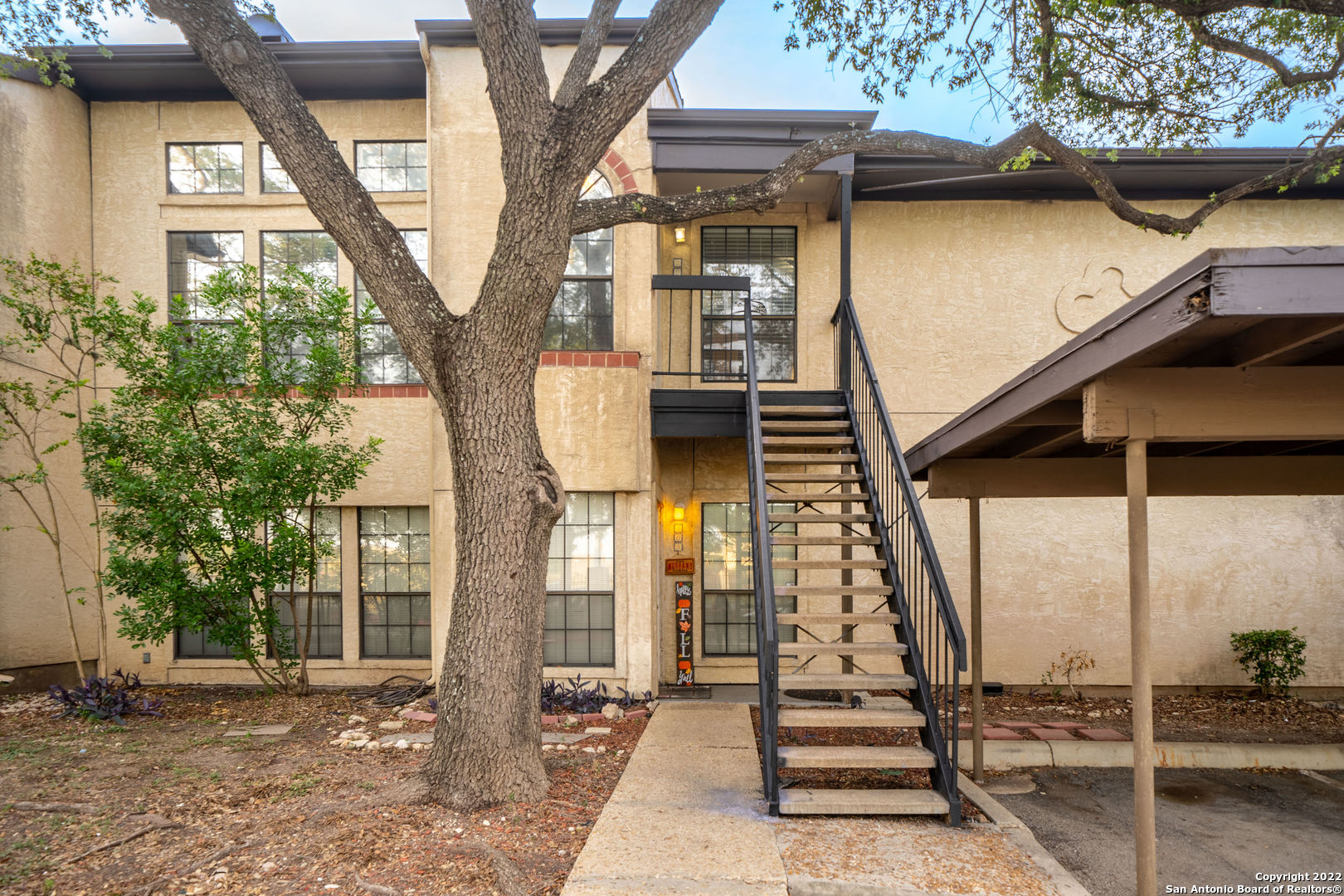 Beautifully remodeled condo located in the gated community of The Village at Woodlake, just minutes away from Randolph Air Force Base, Loop 1604, and I-35! This condo features a spacious, open floor plan, a wood burning fireplace, and high ceilings make it open and bright. The large master bedroom features a private balcony, skylights, and dual closets. Separate dining area with access to additional balcony with a beautiful pool view. Fees include water, exterior maintenance, insurance, and pest control.