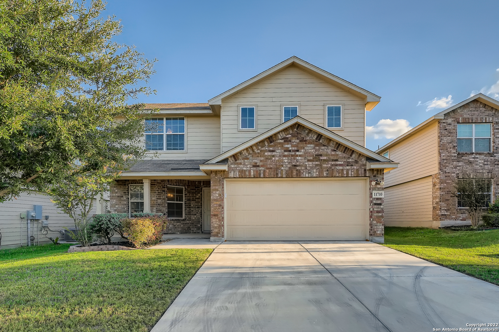 Click the Virtual Tour link to view the 3D Tour. This lovely two story home just minutes from Lackland AFB and less than 30 minutes from downtown boasts more than 2300 sqft and less than 10 years old. As you walk in notice the separate dining room that has a great view of the manicured front yard. Continuing into a wide open floor plan is the modern kitchen that opens up beautifully to the spacious living room. The tiled backsplash matches beautifully with the granite counter tops as well as the spacious breakfast bar. The large living room boasts high ceilings giving off a airy atmosphere. High ceilings continue into the large primary bedroom that is located on the first floor away from the other three secondary bedrooms to provide extra privacy. The primary ensuite provides a huge walk-in closet and lovely soaking tub and separate walk-in shower. All secondary bedrooms have easy access to the loft area upstairs that provides an extra living space for new home owners to make their own! The easy to maintain fenced-in backyard provides an easy to take care of leveled green space, storage shed and lovely covered patio. New home owners will also get to enjoy no backyard neighbors!
