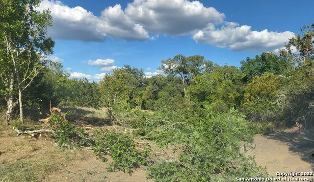 Awesome opportunity to own 13+ Acres in Prime Location, on 0 Scenic Loop close to Boerne Stage Road, Loaded with trees plus wet weather creek.  In the County so less restrictions, but less than 25 minutes, more or less, to downtown San Antonio. Short drive to Leon Springs, the Medical Center, UTSA, IH10W and 1604.  Current Survey Available.