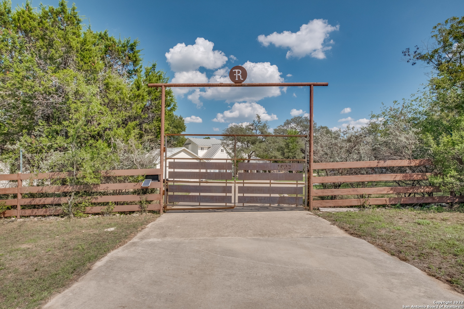 A Wow Horse Farm located 15 minutes to Boerne and just across the River from Sisterdale...several wineries are in the area(and about 30 minutes to Fredericksburg!)  Beautiful long range view to the pastures and beyond; Large 8 Stall Horse Barn (approx. 26' x 70') w/Quarters (Full Bath, Kitchen & Bedroom):  This is the type of Barn that is welcoming to spend time in...it is situated to catch the breezes and offers wide breezeways and covered area for equipment storage or gathering. Owner has hosted gatherings in the barn and outside spaces.  Property features multiple pastures, is completely fenced and offers excellent Coastal Hay production (60 to 70 Round Bales according to owner) plus a beautiful Hill Country backdrop.   Home is charming w/a flexible floorplan (2 Bedrooms w/Ensuite Baths on Main Level); Loft, 2 Bedrooms, Alcove & Full Bath on 2nd level.  Beautiful Beams in Great Room Area which opens to the Dining Area;   Kitchen is neutral and offers abundant counters; Full Length Screened Porch over looks rocked patio area w/Chimenea-style fireplace.  Raised Bed Gardens are located on the side of the home w/piped water proximity.  Detached 2 car garage and Well w/Storage Tank round out this special property.