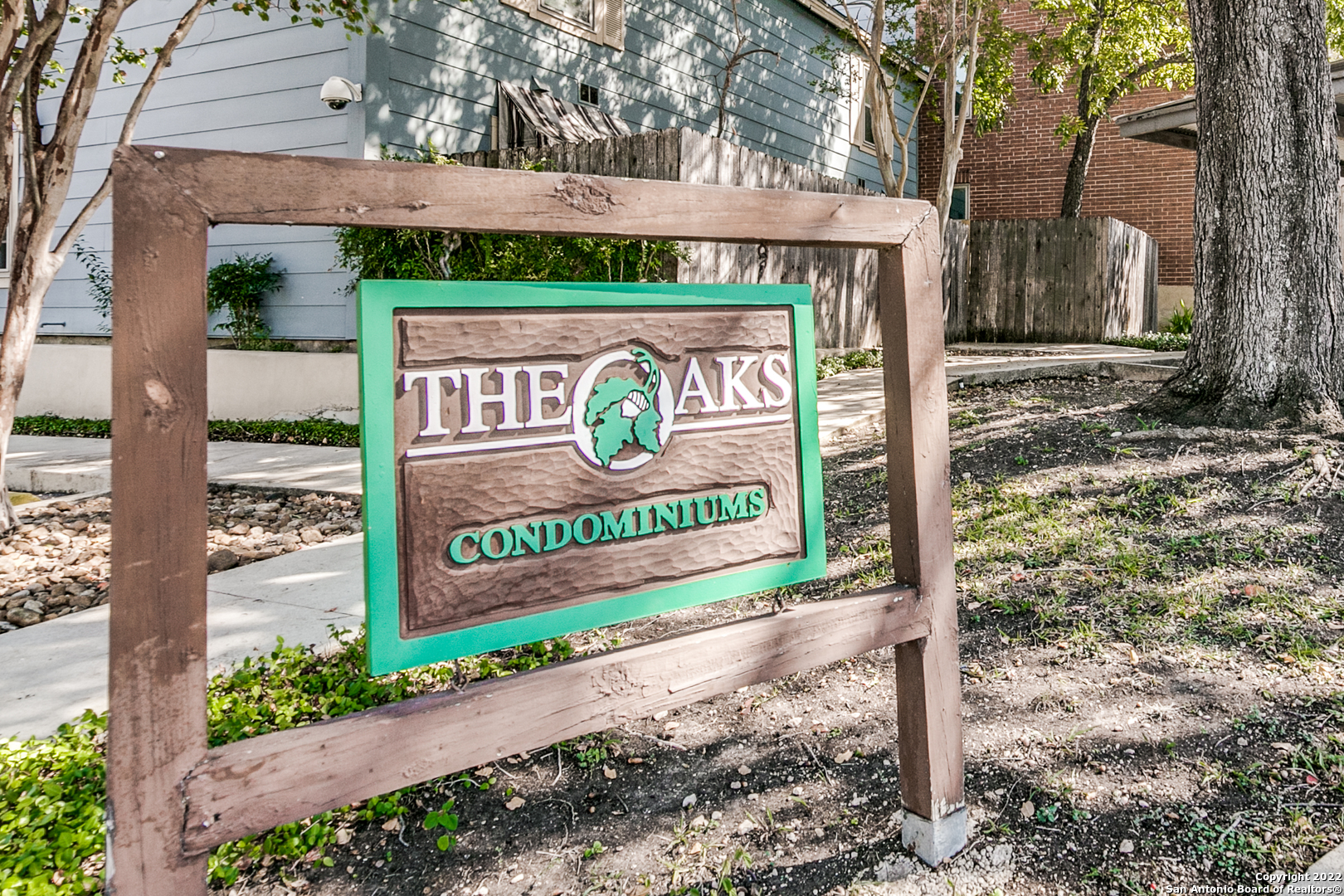 The Oaks Condominium community offers an upscale, carefree lifestyle. Conveniently located just inside Loop 410 in the desirable Alamo Heights School District, quick access is available to the airport, Hwy 281, IH 35, Fort Sam Houston, Randolph AFB, UIW and Trinity University. This spacious 2 bedroom, 2 bath upstairs unit is move-in ready! Amenities include wood laminate flooring throughout, modern tract lighting in the living area and a bright updated interior. This extremely well-maintained condominium complex features refreshed building exteriors, splendid oak covered grounds, reserved parking, community pool and professional on-site management. Low-cost monthly utilities due to commercial billing rate. An excellent buy, this unit is priced to sell quickly!