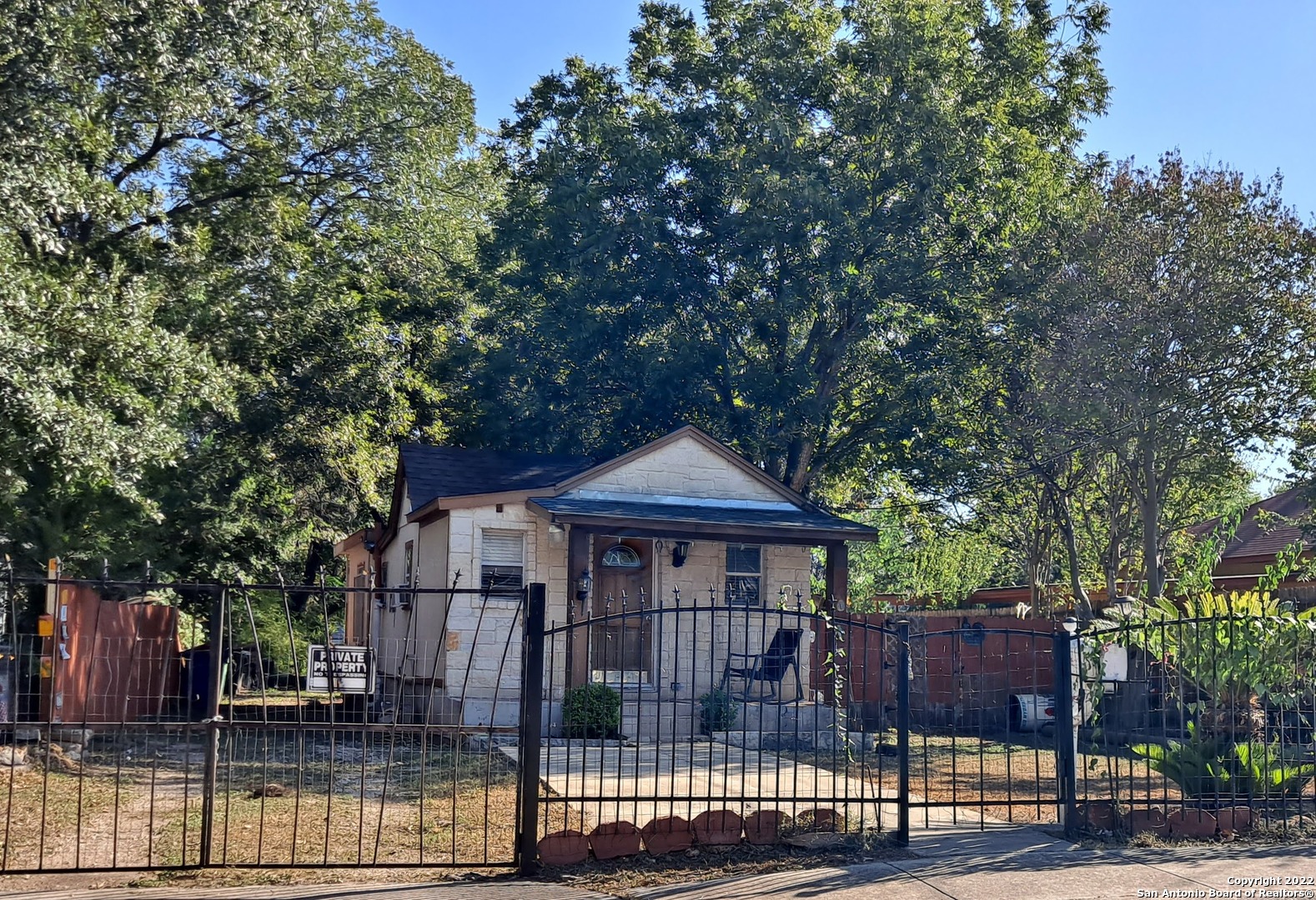 This one is all about LOCATION! Cute 2 BR Home, needs some TLC...SOLD AS-IS, Owner does NOT have survey - buyer must purchase. Come see it before it's gone! Nice size lot, roof is 1 yr old, iron front fence, gas stove in kitchen, mature trees, some trees are Pecan, South of Southtown, just 5 minutes from downtown, Mission reach bike/walking trail only 1 block away, Riverside golf course just 1 block away,  Mission Concepcion Park 3 minutes away. Morrill elementary less half a mile down the road. Both vehicles on the property will be removed before closing.