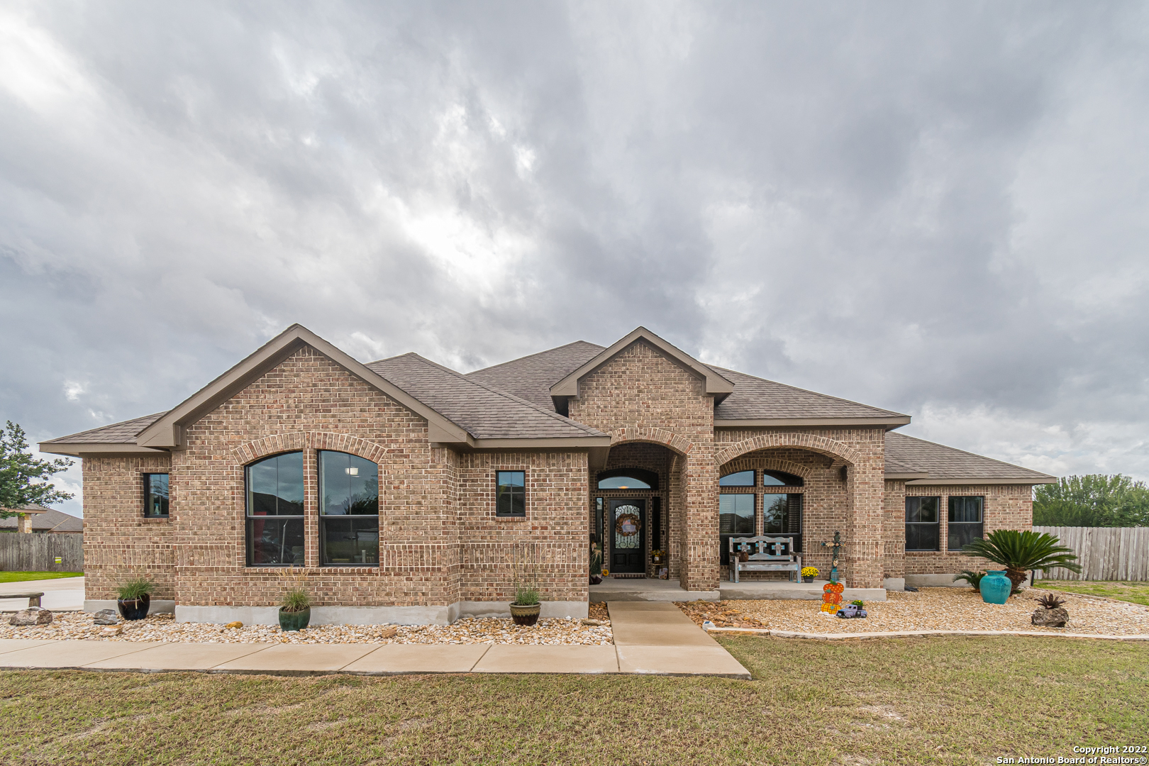 STUNNING 2600 Sq Ft Custom Built Home in the Popular Summit Subdivision and Navarro ISD! High End finished features in this 4 Bedroom (4th Bedroom or Office) / 2.5 Bath home on 1/2 Acre lot. As you enter the home your welcomed by a Large kitchen island and open floorplan that are all CROWNED with wood beams that carry into the PRIMARY BEDROOM! Kitchen is designed with entertaining in mind with GRANITE COUNTER TOPS, POT FILLER , CUSTOM BACKSPLASH, BUILT IN OVEN with CONVECTION, COFFEE BAR, WINE STORAGE and WALK IN PANTRY...A CHEF'S DREAM! A MUST SEE IS THE PRIMARY BEDROOMS CLOSET...DRESSER/JEWELRY AREAS ALL BUILT IN! PRIMARY BEDROOM HAS AMAZING WINDOWS for LIGHTING, WOOD FLOORING and sits off the BACK of the home for privacy. Livingroom area is a step away from the LARGE COVERED BACK PORCH with a hot tub that all overlook the private back yard & pool. THIS IS A VERY WELL MAINTAINED HOME AND WILL NOT DISAPPOINT!