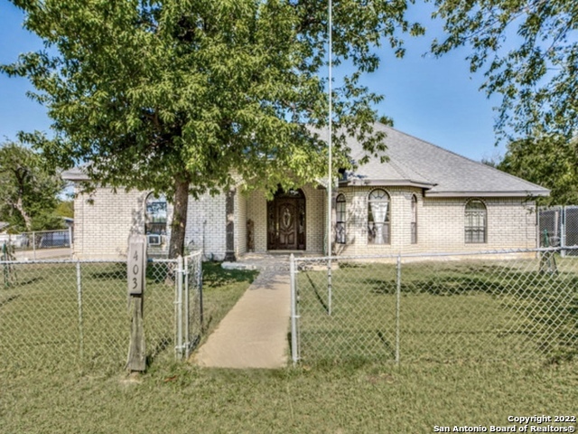 OPEN HOUSE 11/5 from 1-4pm. MOTIVATED SELLER!!! Ever thought of living in the beautiful TEXAS HILL COUNTRY of BANDERA, TEXAS also known as "Cowboy Capital of the World"? Well great news...we have a home for you! This brick one story home features an oversized corner lot with 3 bedrooms, 2.5 baths and an oversized den/bonus room converted from the one car garage. Sellers have added a an oval patio with lighting for outdoor seating, a 24ft partially inground pool with a large wooden deck, built an outdoor shop and greenhouse with subpanel electric and RV hook ups for water and electricity, 2018 they upgraded kitchen with granite countertops and roof was replaced with 30 year shingles and installed radiant barrier in attic. 2022 New Goodman 4.5 ton heat pump (both inside and outside) were installed. 2019 new water heater was installed. Schedule your showing today!