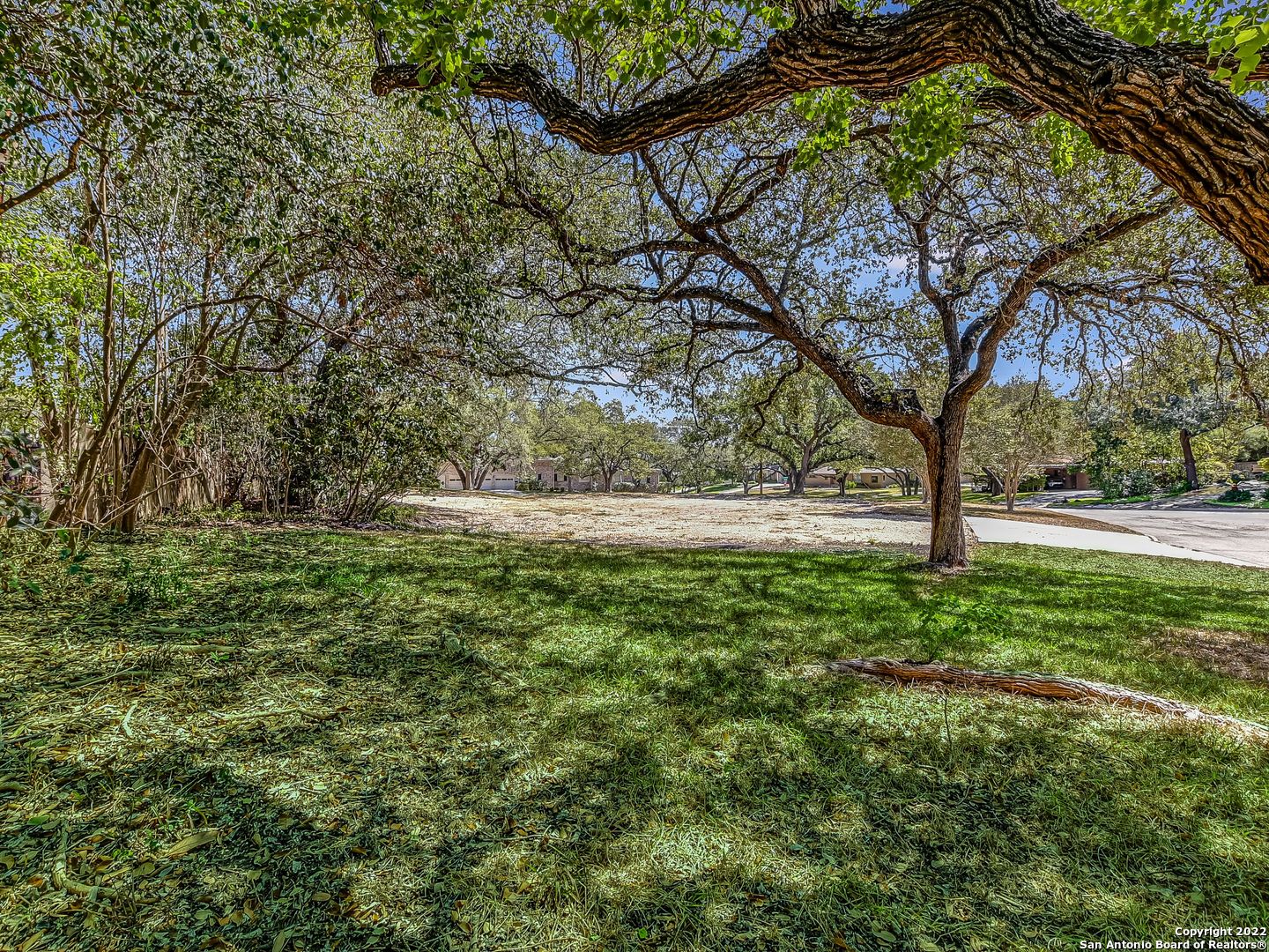 Now listed is the perfect lot ready for your clients to build their dream house. In Terrell Hills on a tree-lined street, this .67 acre lot is cleared and perfectly priced for the current market. There are majestic Oak trees scattered in a beautiful pattern across the property, and the corner lot location provides supreme privacy. Centrally located in San Antonio and in very close proximity to the SA Airport, major shopping area, The Pearl, downtown, and significant freeways.