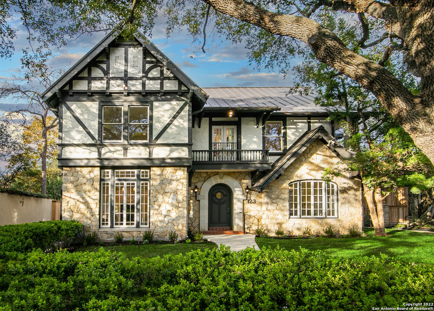 Reviving a Revival: The Reimagining of a Grand Terrell Hills Tudor  Seldom do you see a historic property of this caliber and size that has been beautifully restored. A true collaborative work of art, this extensive renovation project is presented on Geneseo, the most prestigious street in Terrell Hills. Designer driven interior changes have transformed this 1920's stone and stucco Tudor style estate originally built by John Hagy.  The premier property features 5 bedrooms, 4.5 baths plus a separate casita with full bath and attached 3 car garage. Stunning, new state of the art culinary kitchen with Viking appliances, Waterstone faucets, quartzite counters and sleek custom cabinetry plus hidden walk-in pantry storage and intimate wine /bourbon bar room with Hoshizaki ice maker and 2 drawer refrigerator chilling unit. Spectacular primary suite with marble counters, marble flooring, top of the line Rohl plumbing fixtures, Victoria and Albert soaking tub, walk-in shower with dual shower heads, dual vanities, Toto toilet, and dual walk-in closets with built-in shelving. Completely renovated guest bathrooms with marble counters and flooring. Amenities include beautifully refinished hardwood floors, period plaster walls and new decorator lighting. Brand new swimming pool installation with in-floor cleaning system, spa and pool deck fountain jets.