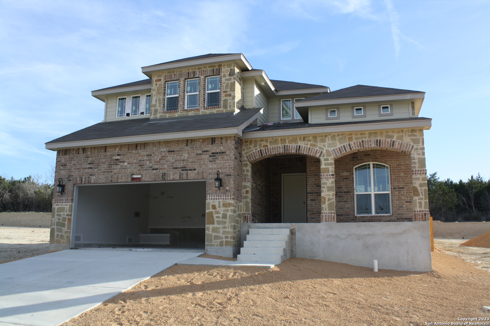 Our beautiful Mesquite plan, Upgraded B elevation with curved stairs in the entry.  5 bedrooms or 4 bedrooms and Media room,  plus nice gameroom.  Very nice back yard with large wrap around covered back porch.  Ready to move in; Feb. 2023...