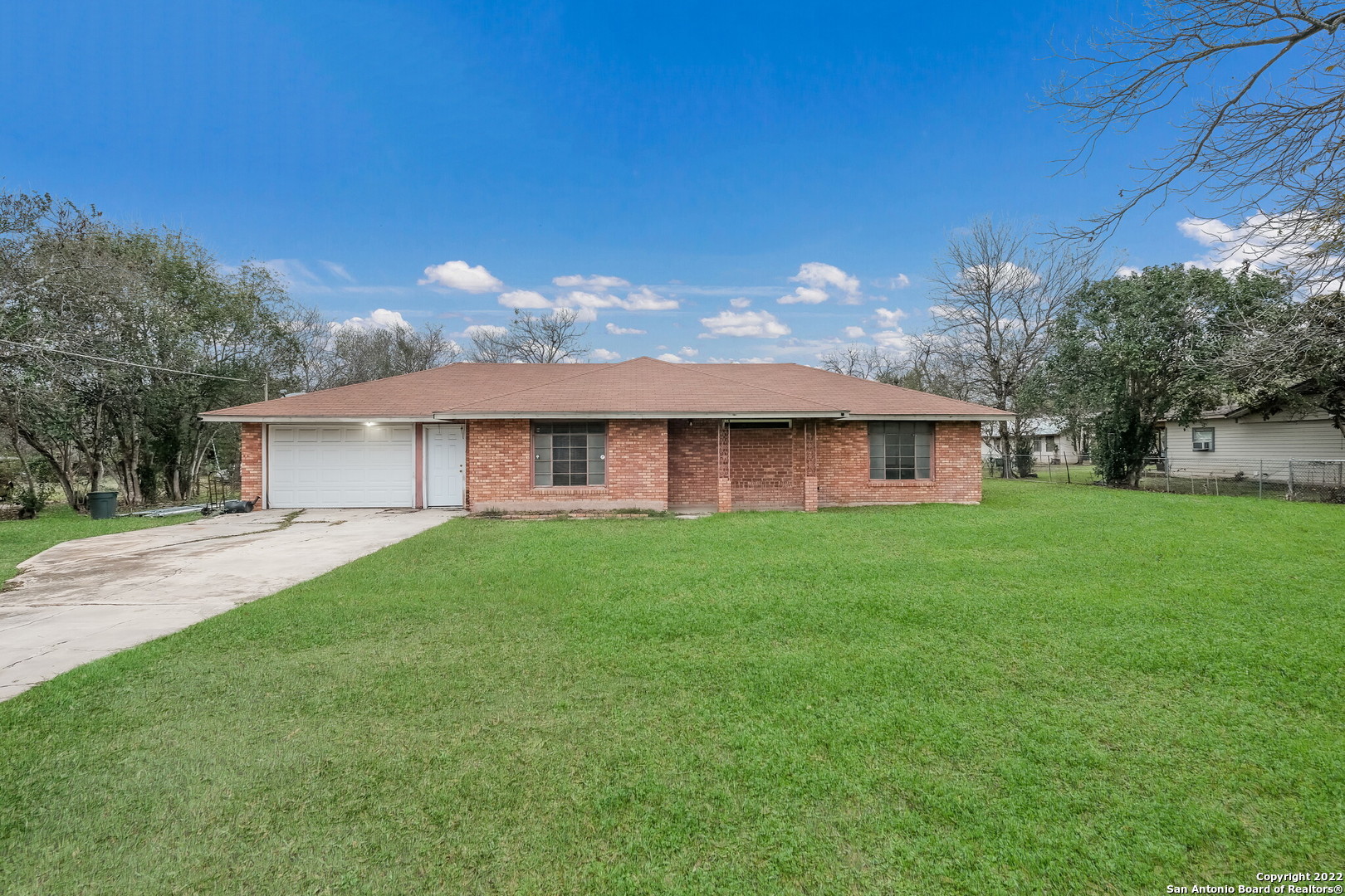 Have you been searching for a 1 ACRE property that is private, minutes away from downtown San Antonio, and located near major highways, restaurants and shopping? Well look no further because this is the one for you! This spacious, 4 side brick home sits on a large 1 acre lot with plenty of space and trees galore! With an open floor plan and all the rooms tucked away privately on one side of the home, this home is ready for you to give it some "TLC" and make it your own with some fresh cosmetic updating. Sit on the back patio and imagine all the possibilities of what you can do with 1 acre! Homes with this much land so close to the city are hard to find, so make sure you go and see it today!