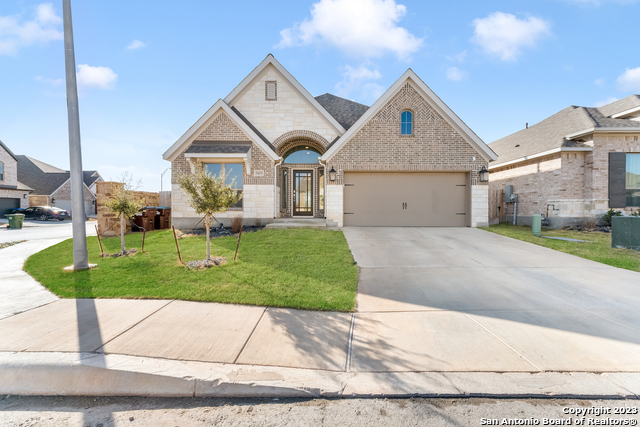 **Open House Friday 1/20 and Saturday 1/21 from 1-4PM** Are you looking for a brand new Perry Home without having to wait for the building process?! This is the home for you and it comes with over $35,000 in upgrades! This beautiful single story corner lot home was built in 2021 and comes with loads of upgrades! As you enter the home you're greeted with 12-foot ceilings and the home office with French Doors. Walking through the extended entry leads you directly to the open kitchen, dining area, and family room. Kitchen features gas cooking with a corner walk-in pantry, generous counter space and island with built-in seating space. Dining area flows into the family with room with tons of windows to allow natural sunlight! Master Bathroom offers double vanities, two walk in closets, tub, and glass enclosed shower. Secondary bedroom does offer its on en-suite bathroom as well to allow for a guest suite or second master bedroom. In the back yard you will find an extend covered patio for all entertaining needs. There is a mud room off the two car garage entry. Property also has solar panels on the home with full 25yr transferable warranty!! These solar panels will allow you to have a $0 electrical bill! Plenty of privacy with no neighbors behind or beside you!