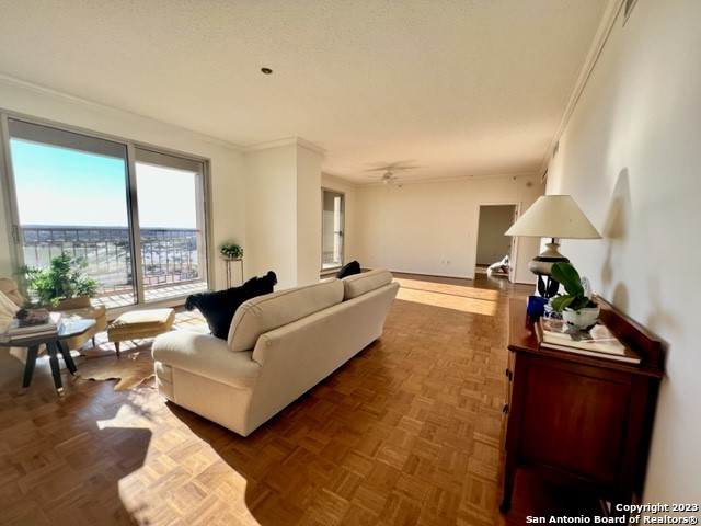 Beautiful view of the downtown skyline from all rooms, parquet wood floors and kitchen open to large living & dining area, unit is in good condition & freshly painted. "R" floorplan... The Towers on Park Lane is an Exclusive Luxury Hi-Rise Co-op for adults 55 years + and offers a lifestyle much like that of living in a Luxury Hotel. Upon arrival you are greeted by a valet who will park your car and take your personal items up to your residence. Numerous concierges are available to help with your ever need. Located in the lobby is a beautiful white tablecloth restaurant and a darling bistro to grab a quick bite if you don't feel like cooking. Better yet- order room service and have your meal delivered! The building amenities are tremendous and feature a heated indoor pool and spa, locker rooms and a fitness center and that includes a variety of classes and work out equipment, a gorgeous 4 1/2 acre park with walking trails, outdoor patios and personal gardening beds, a library, card room, an astounding wood working shop, business center, CLUB 22 - an oak paneled lounge on the 22nd floor with large windows and balconies overlooking the downtown skyline, an art studio, billiards table,  laundry facilities on every floor for those residence that do not have W/D connections,  on site storage units, ten guest suites on the second floor, EV charging stations (coming soon), meeting and banquet rooms with catering services available thru the food & beverage department and above all 24/7 Resident Safety Officers!   The many benefits  provided in the monthly Co-op fee include weekly housekeeping, Wi-fi/ Cable TV (including Showtime and HBO)/ water and garbage, concierge and valet services, fitness instructor for personal training and group classes, scheduled transportation, recreational/ educational/ cultural and social programs, secured covered parking with direct entry to the building, 24 hour security and surveillance of grounds, monitored fire alarms and sprinkler system throughout building, monitored emergency call system in each residence.   In addition to all that the Co-Op provides the residents have and active and close knit community offering many engaging social opportunities! The building is an extension of your personal living space and there is something special for everyone.   The Co-op has a well-funded financial reserve and can boast they have never had a special assessment.