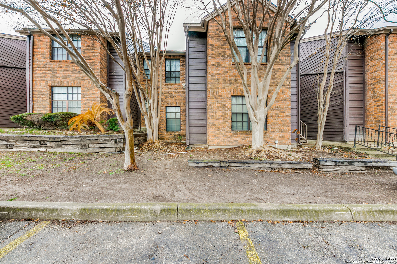 2 bedroom to 2 bath moderately conserved condominium nested in SyglasHill. This condo has a one-car carport reserved and the back patio faces the second pool. Schedule a showing today