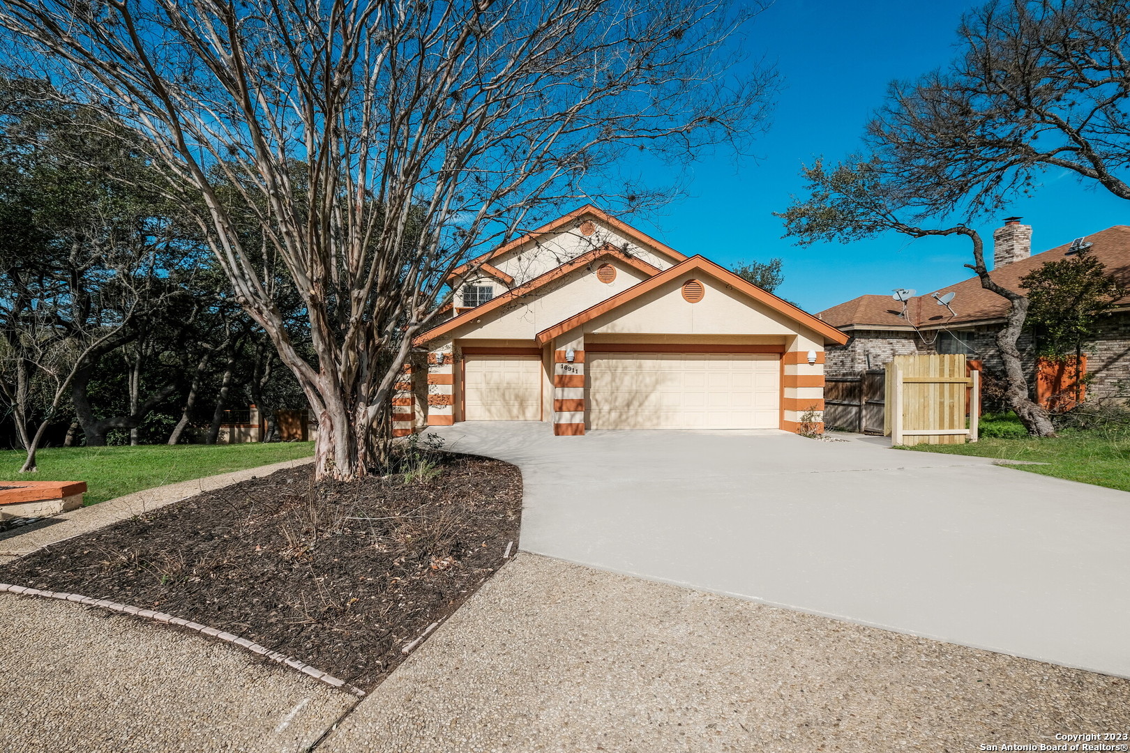 Open House Sat. 2/25/23 1- 4 PM.  Lovely Mediterranean Style home in Blanco Woods. Great location with very good schools, almost 1/2-acre (0.442 acres) homesite with multiple trees, multiple decks, beautiful landscaping, gorgeous country view and gazebo; cul-de-sac lot backing up to a true greenbelt. One bedroom downstairs, 3 upstairs. Spacious master bedroom featuring a separate sitting area that would be perfect for a nursery, exercise room or office. Oversized 2.5 car garage has plenty of space for a workshop, golf cart or extra storage area. This home is an entertainer's delight. Don't miss out on viewing multiple attics with entry through a closet door in upstairs bedroom. You will be surprised to find so much storage space.