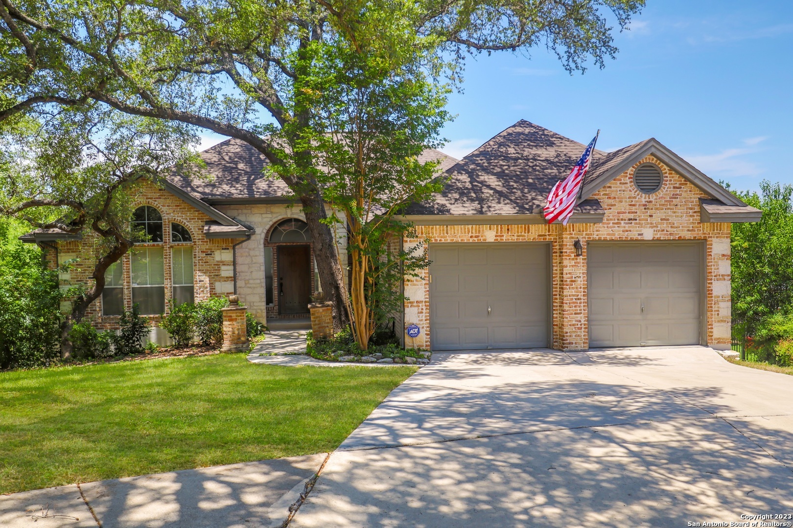Gorgeous updated home is truly move-in ready. Nestled on a cul-de-sac in the desirable Deerfield community, this home boasts mature trees, open living and a spacious Texas-sized backyard. The owner's suite is located on the main floor complete with separate tub/shower and ample counter space. The open main living area has an abundance of natural light, a gas fireplace and access to the upstairs patio. The home has been cleaned, is freshly painted and has NEW carpet. There is an oversized laundry room, pantry and mud room with a utility sink. Secondary bedrooms are located downstairs. There is an additional living area (downstairs) that can easily serve as a 4th bedroom or in-law dwelling. It opens to the covered patio and sprawling manicured backyard. Schedule your showing TODAY!